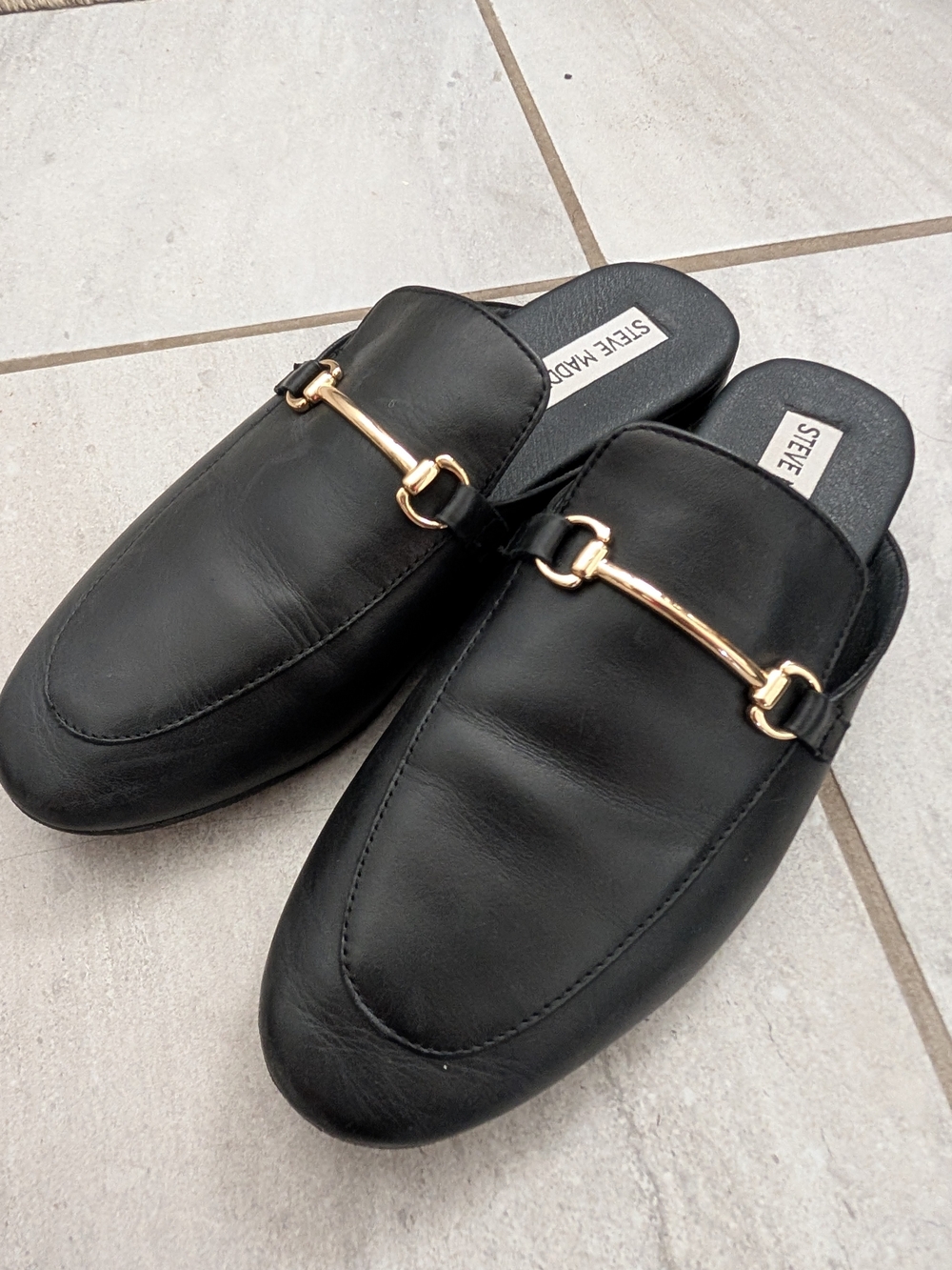 Steve Madden Black Leather Slip-On Mules with Gold Horse Bit Accent